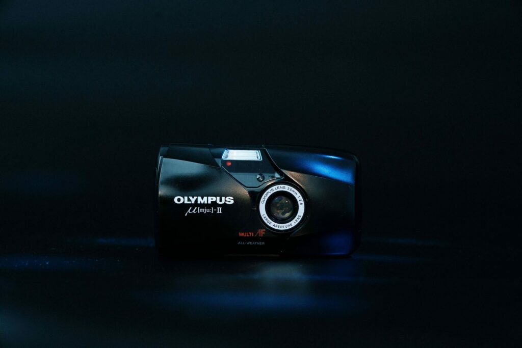 Dark picture of the streamlined design of the olympus mju ii